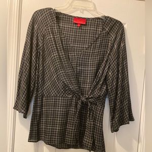 Size small Jennifer Lopez black, white and silver top